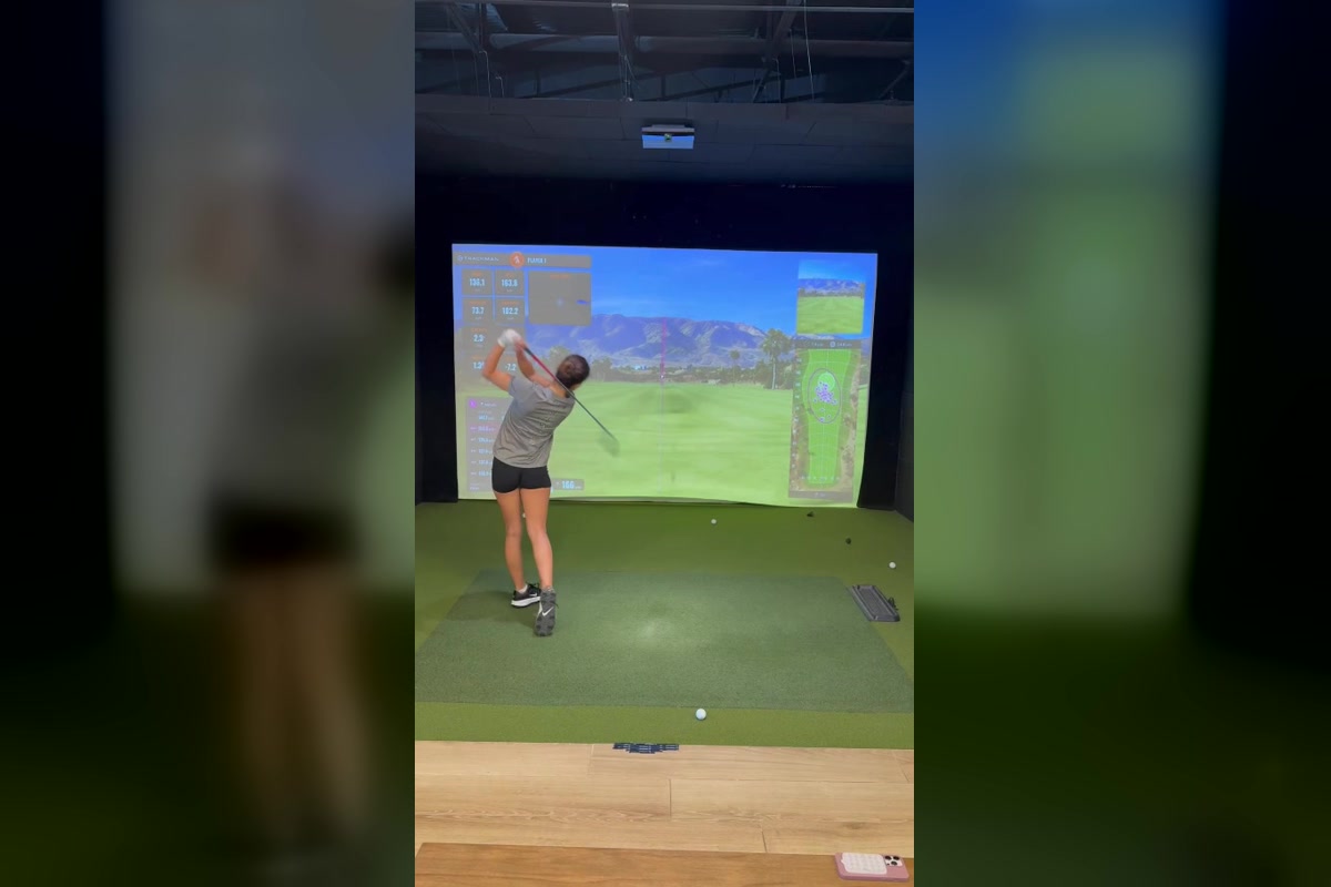 Hawaii amateur golfer testing a Ferro CB iron in the TrackMan bay at Ferro Golf Clubs